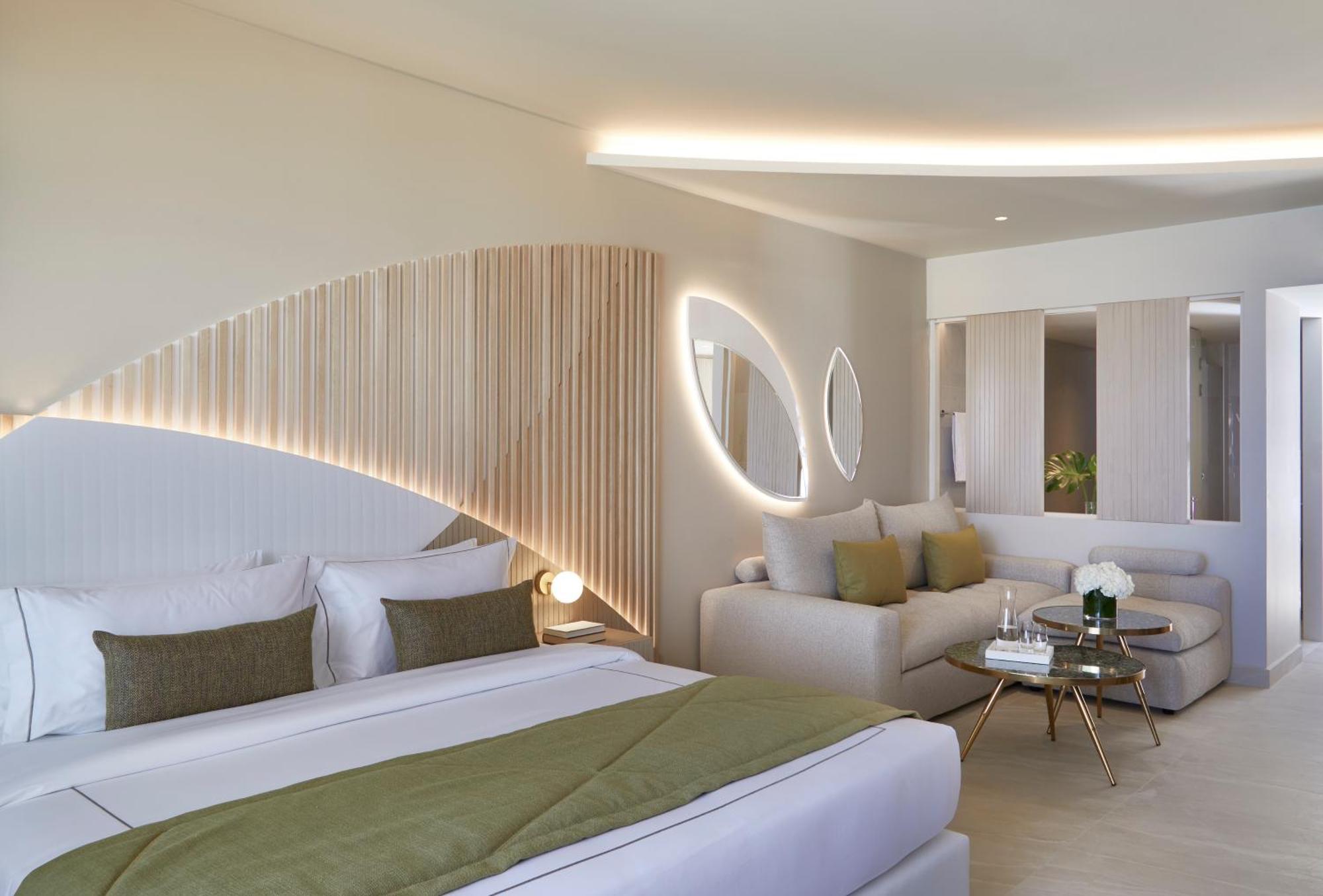 Junior Suite Sharing Pool Sea View