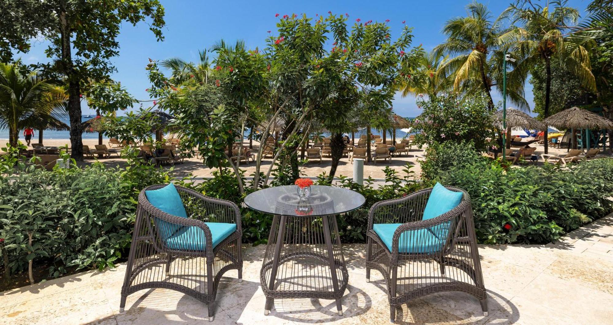 Honeymoon Beachfront Two Story One Bedroom Butler Villa Suite with Tranquility Soaking Tub