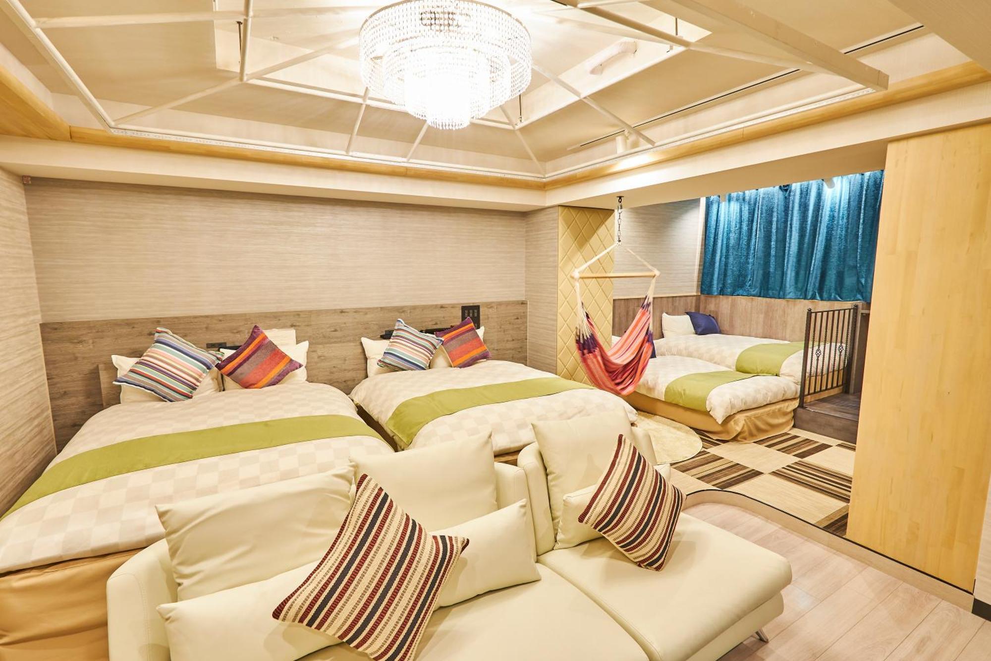 Deluxe King Suite Room Two Double Beds Two Single Beds Non-Smoking